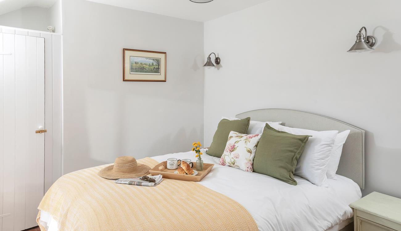 The bedrooms are decorated with tasteful soft furnishings.