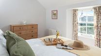 Wake up and enjoy sunny countryside views.