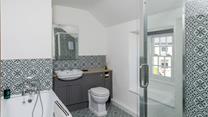 Get ready for the day in the modern bathroom.
