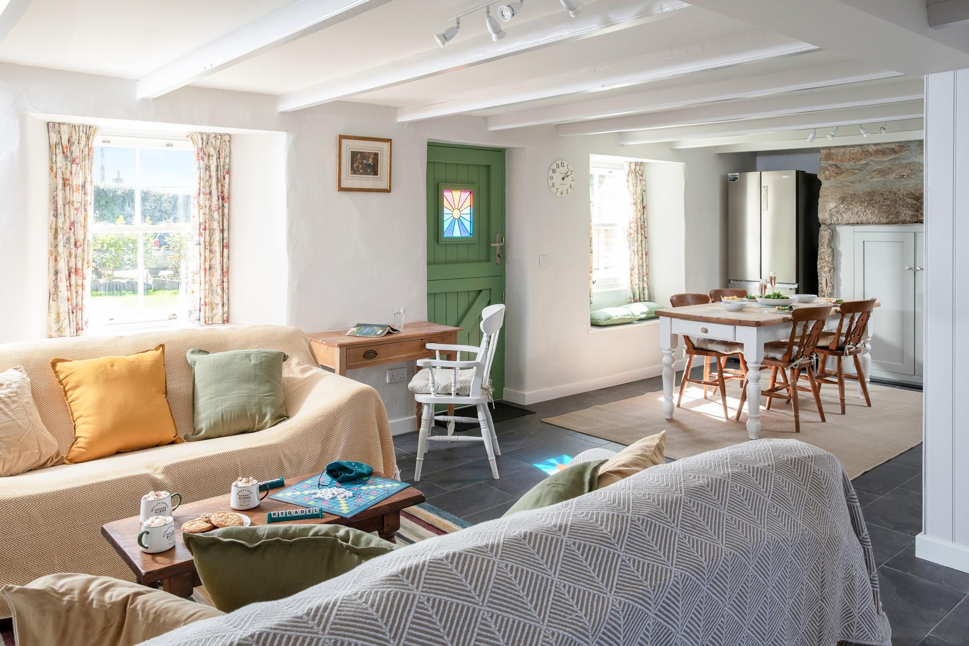 Open plan living is a delight in this cosy cottage.