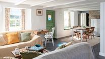 Open plan living is a delight in this cosy cottage.