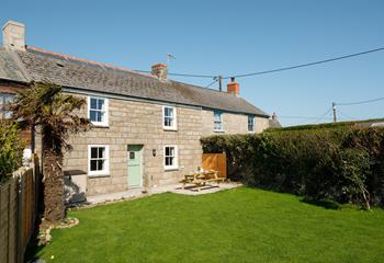 The large garden is ideal for soaking up the sunshine.