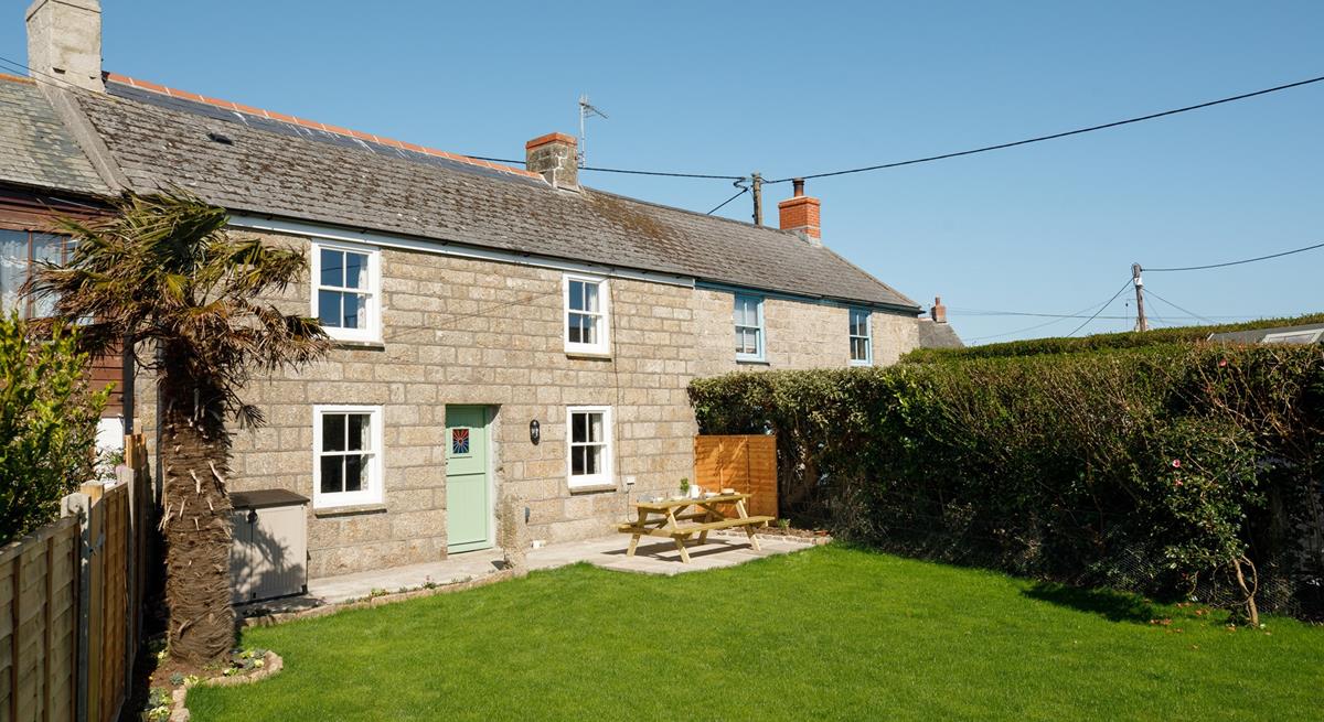 The large garden is ideal for soaking up the sunshine.