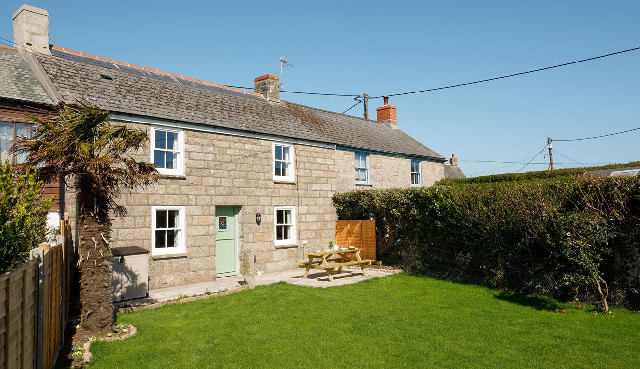 The large garden is ideal for soaking up the sunshine.