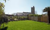 There are lovely views of the church from the leafy garden. - Thumbnail Image