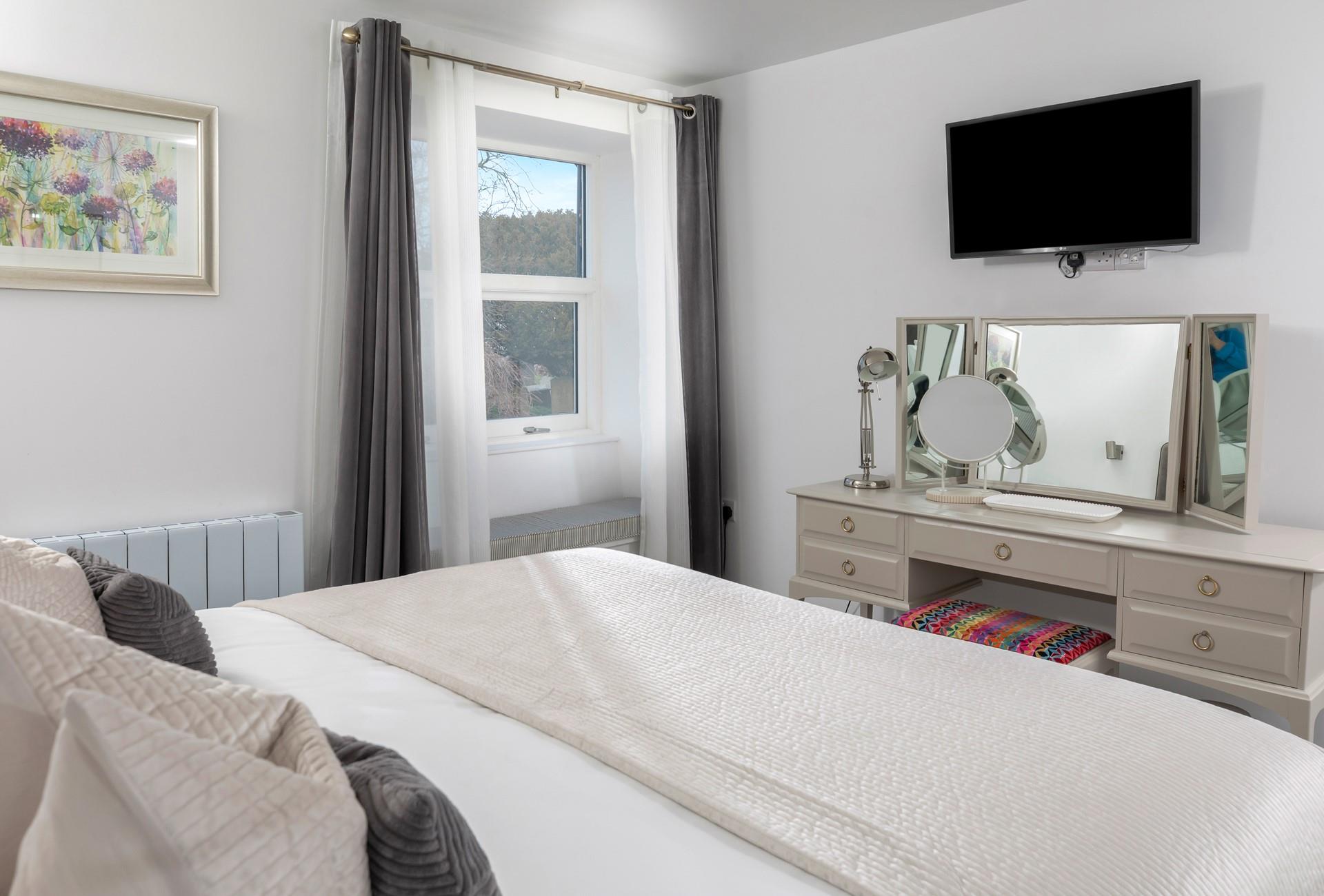 Get ready for the day at the dressing table.