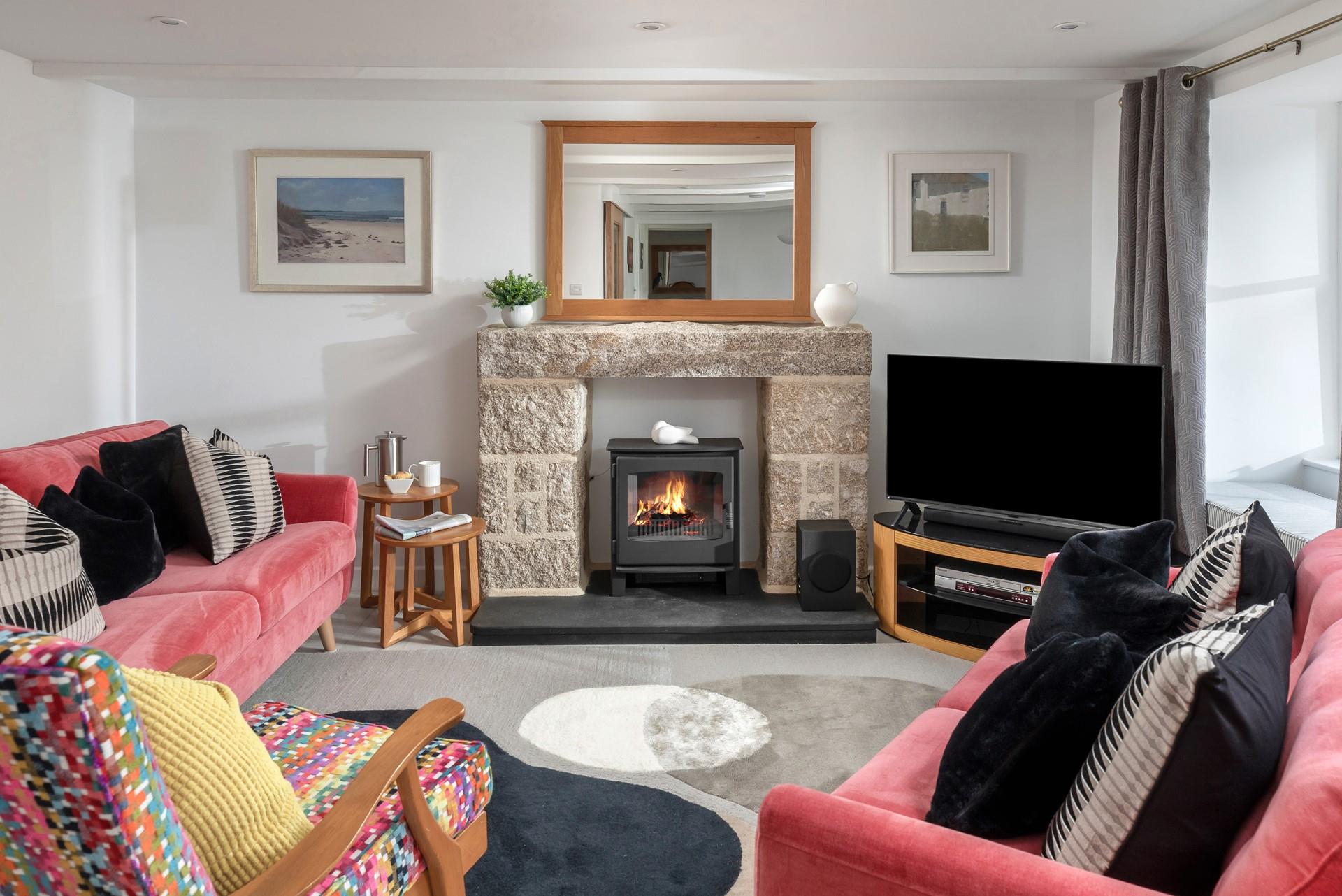 The cosy sitting room is ideal for nights in.