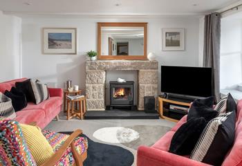 The cosy sitting room is ideal for nights in.