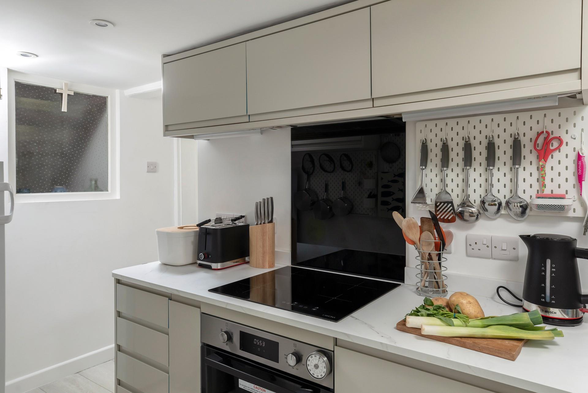 The kitchen is modern and well-equipped.