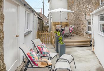 Take a morning stroll to the harbour in Mousehole and return to the sunny garden.
