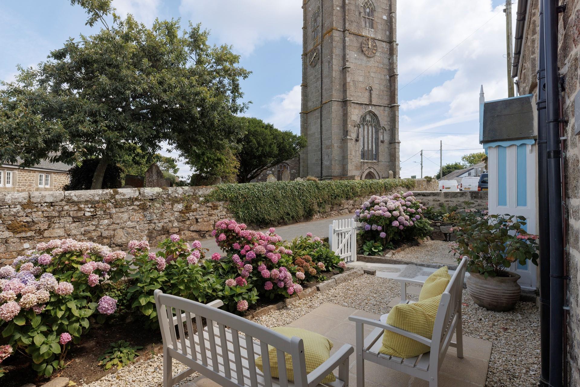 Enjoy a morning cuppa with lovely views of the church.