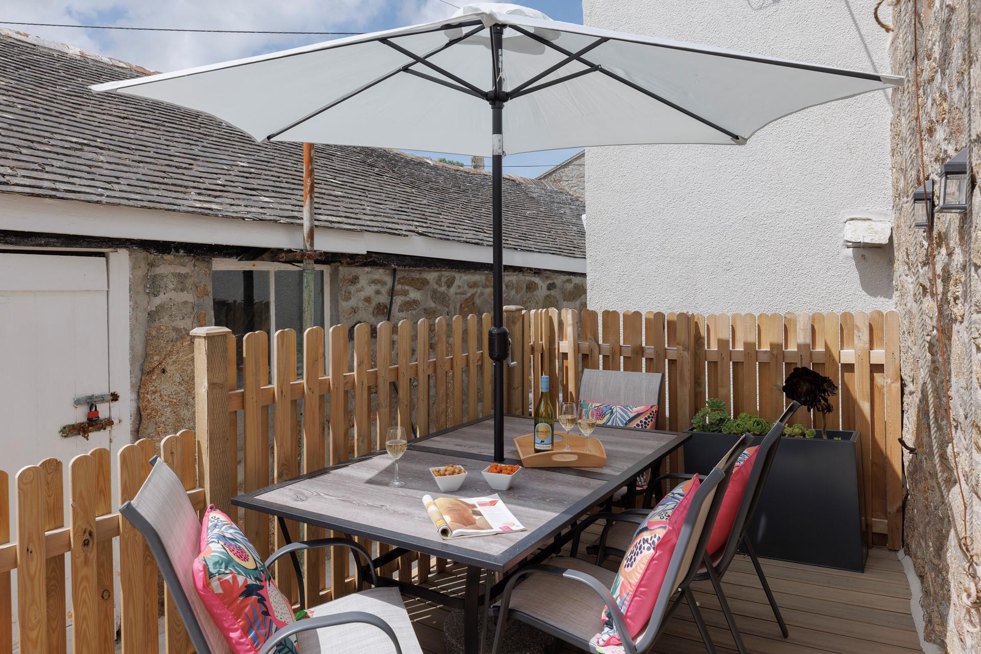 Relax on the decking in the summer sunshine.