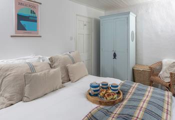 Bedroom 1 has a king size bed for a comfortable night's sleep.