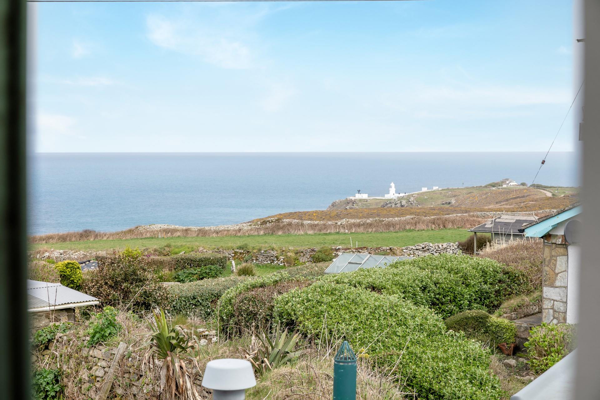 Open the blinds and watch the sunrise over the sea.