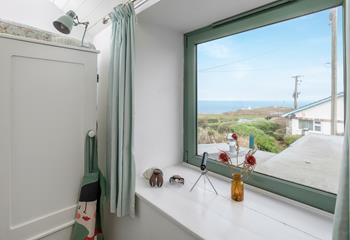 Bedroom 2 offers beautiful sea views.