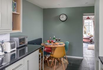 Tuck into a hearty meal around the dining table.