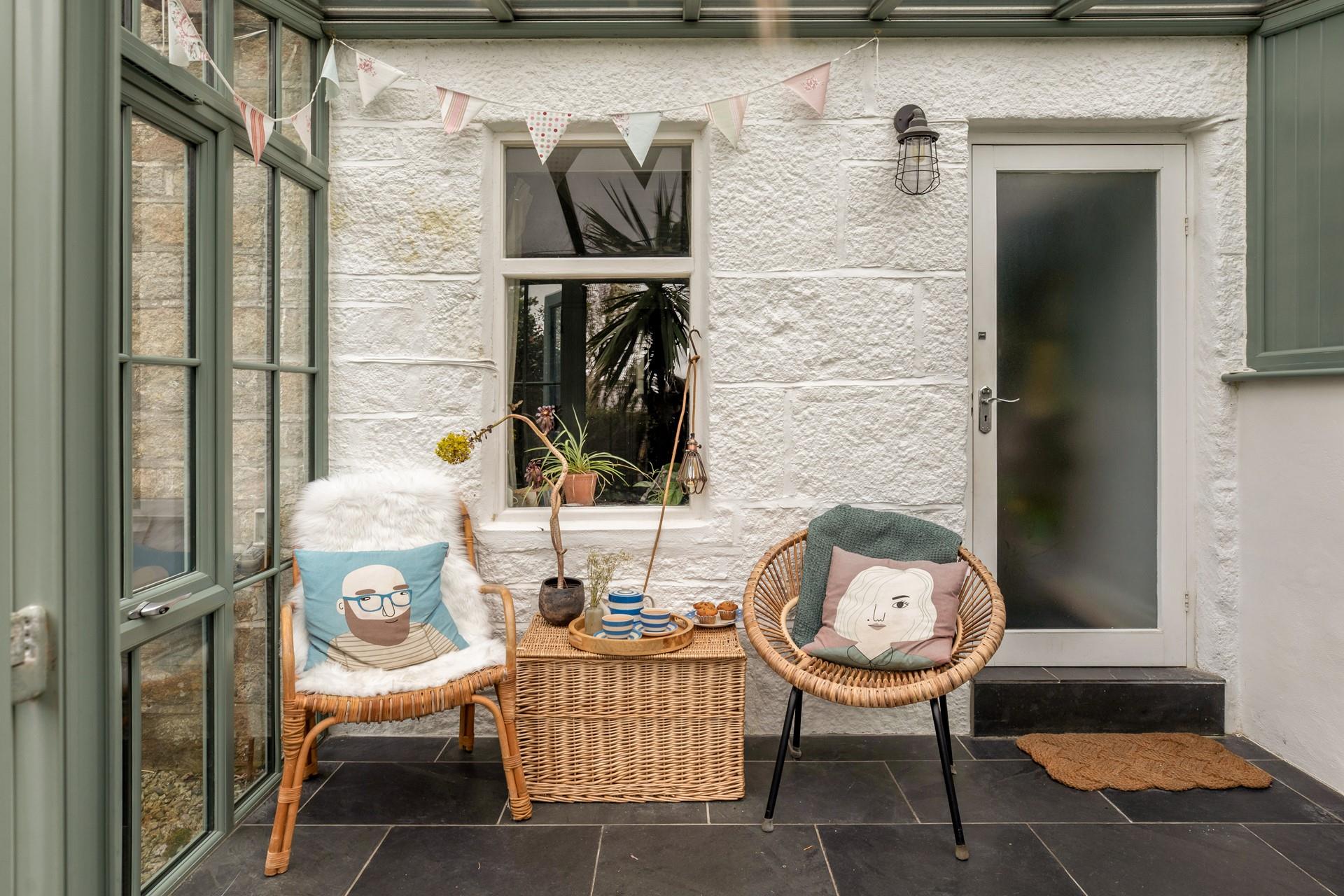 Enjoy tea and cake in the sunroom after a morning stroll around the village.