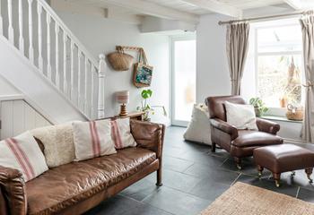 Put your feet up in the warm and homely sitting room.