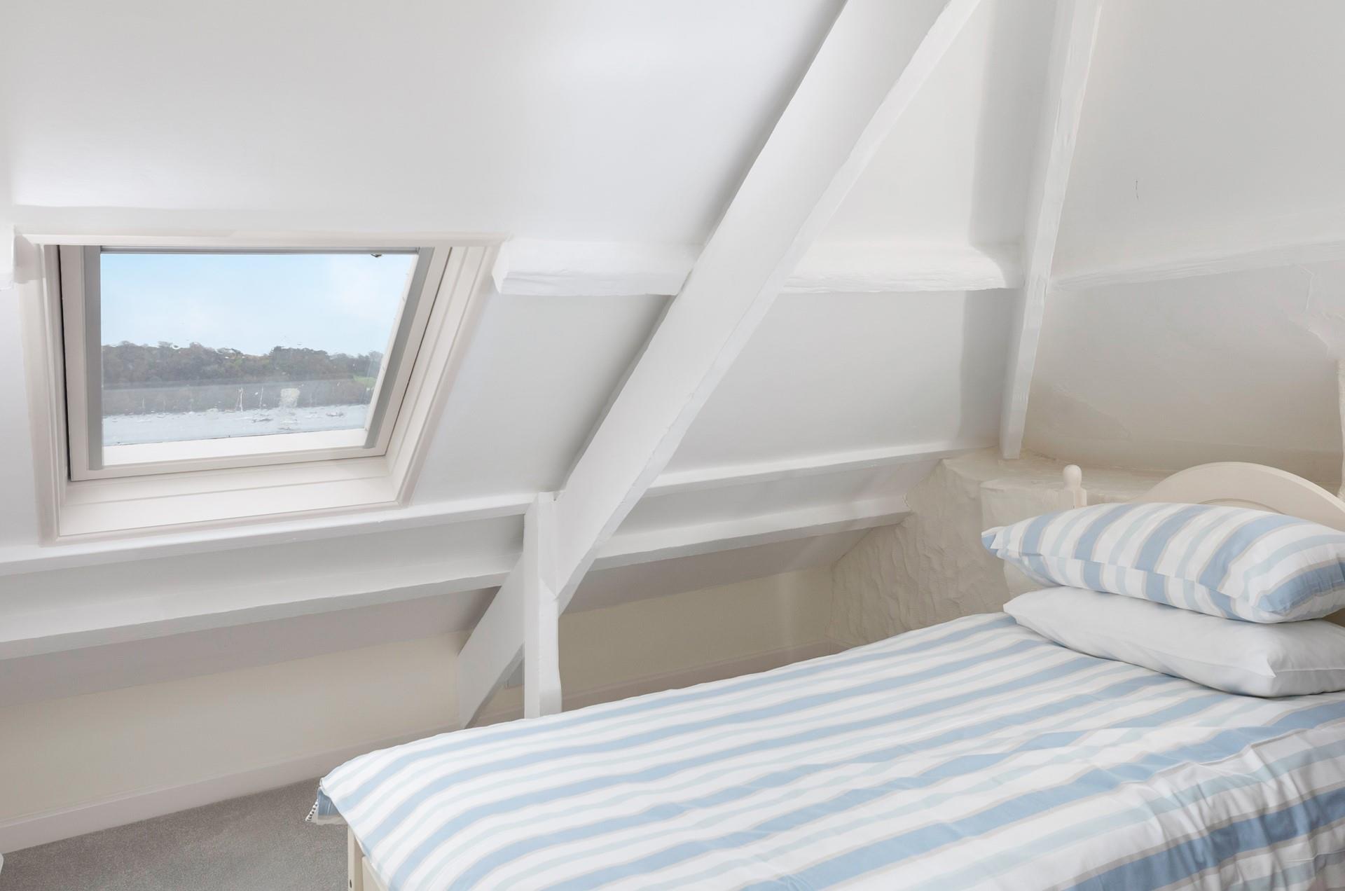 Watch the boats bobbing on the water from bedroom 3.