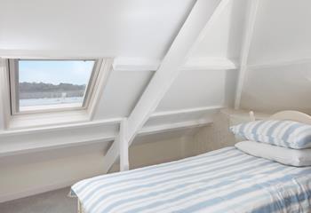 Watch the boats bobbing on the water from bedroom 3.