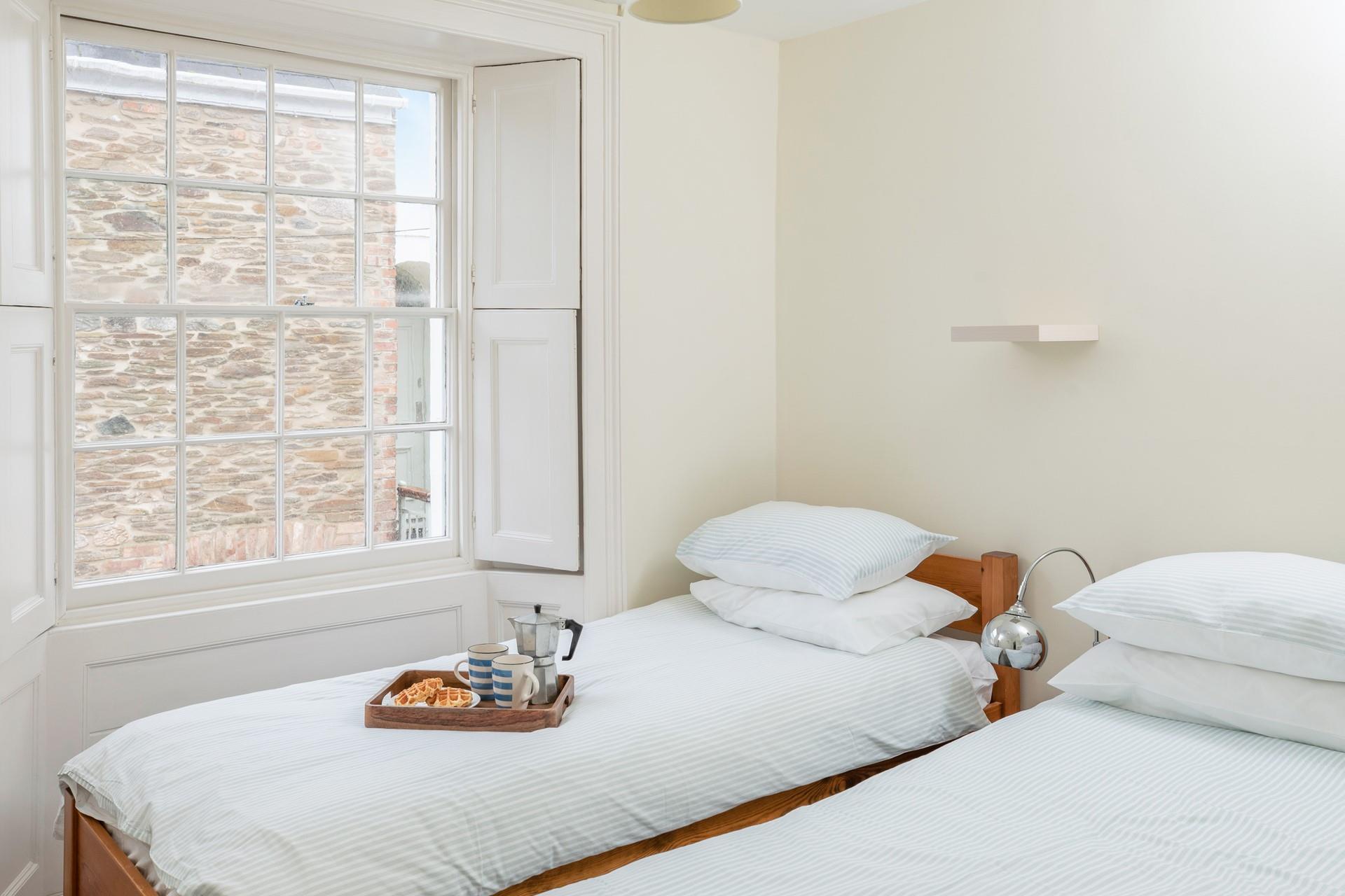 Bedroom 2 has twin beds, perfect for kids or adults.