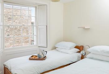 Bedroom 2 has twin beds, perfect for kids or adults.