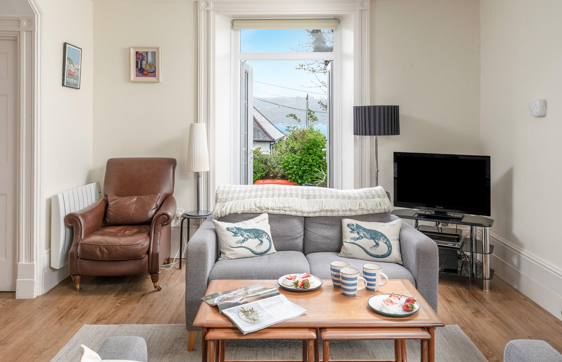 Open the French doors and enjoy sea glimpses through the trees.