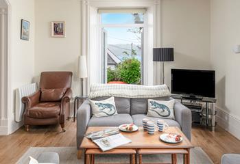 Open the French doors and enjoy sea glimpses through the trees.