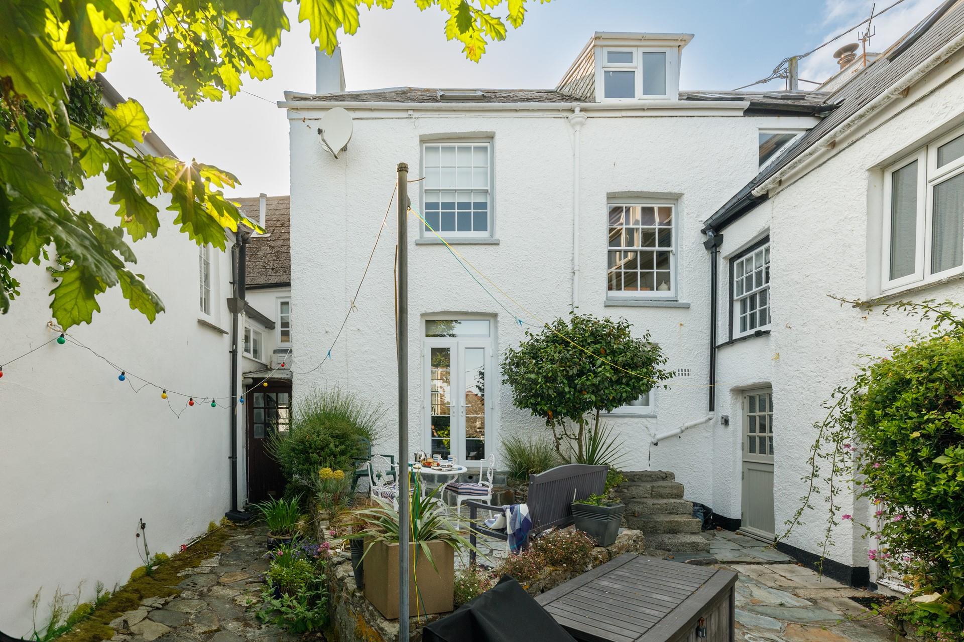 The quaint courtyard is a lovely spot for relaxing after a busy day of exploring the coast.