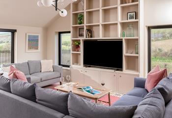 Sink into the comfortable sofa with a glass of wine.