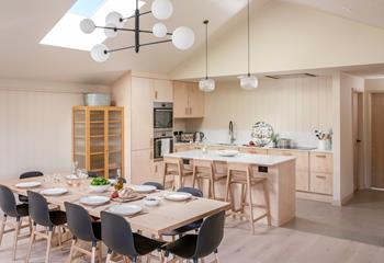 The kitchen is modern and ideal for cooking a hearty meal.