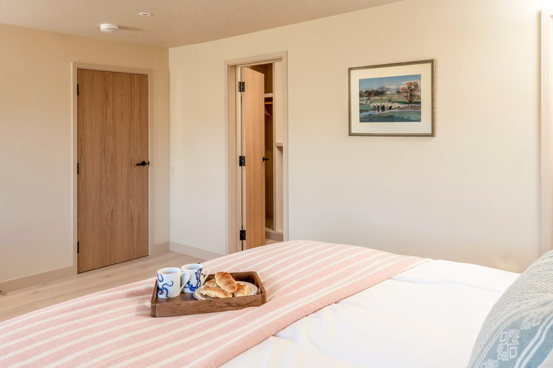 The master bedroom has a walk-in wardrobe and an en suite.