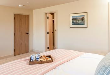 The master bedroom has a walk-in wardrobe and an en suite.