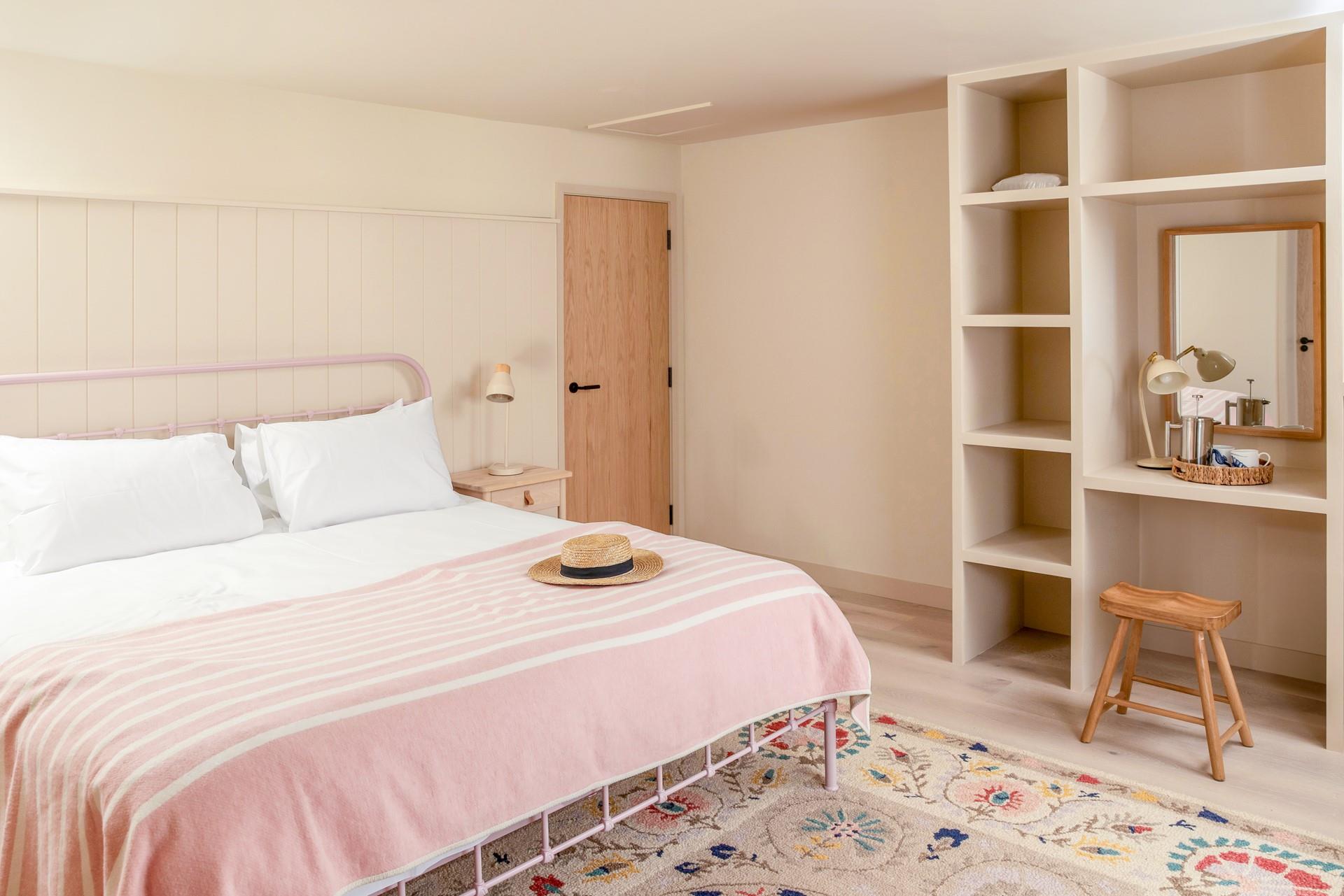 The bedrooms are all stylishly decorated with neutral tones and modern panelling.