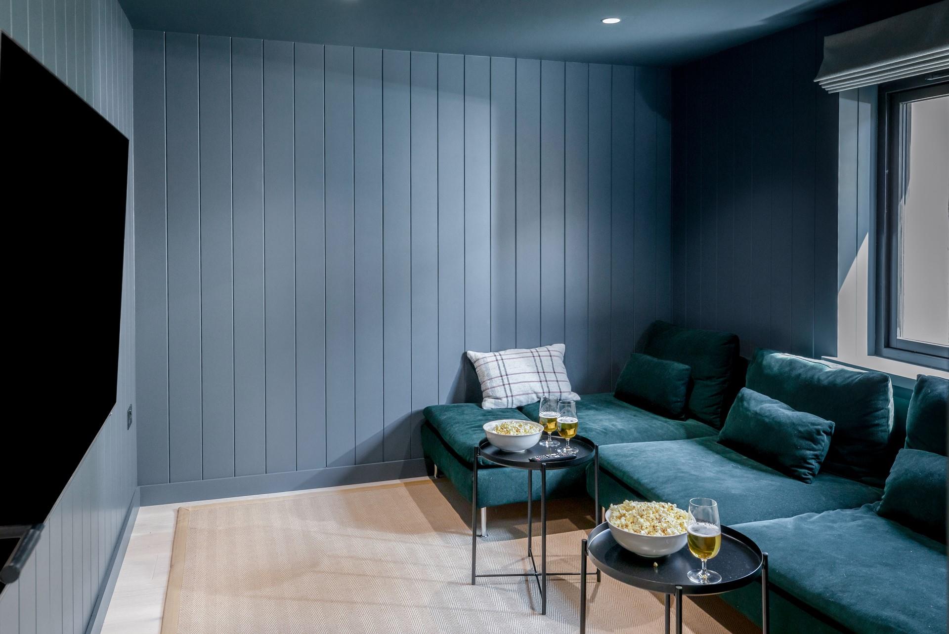 Sink into the plush velvet sofas with your favourite movie on the TV.