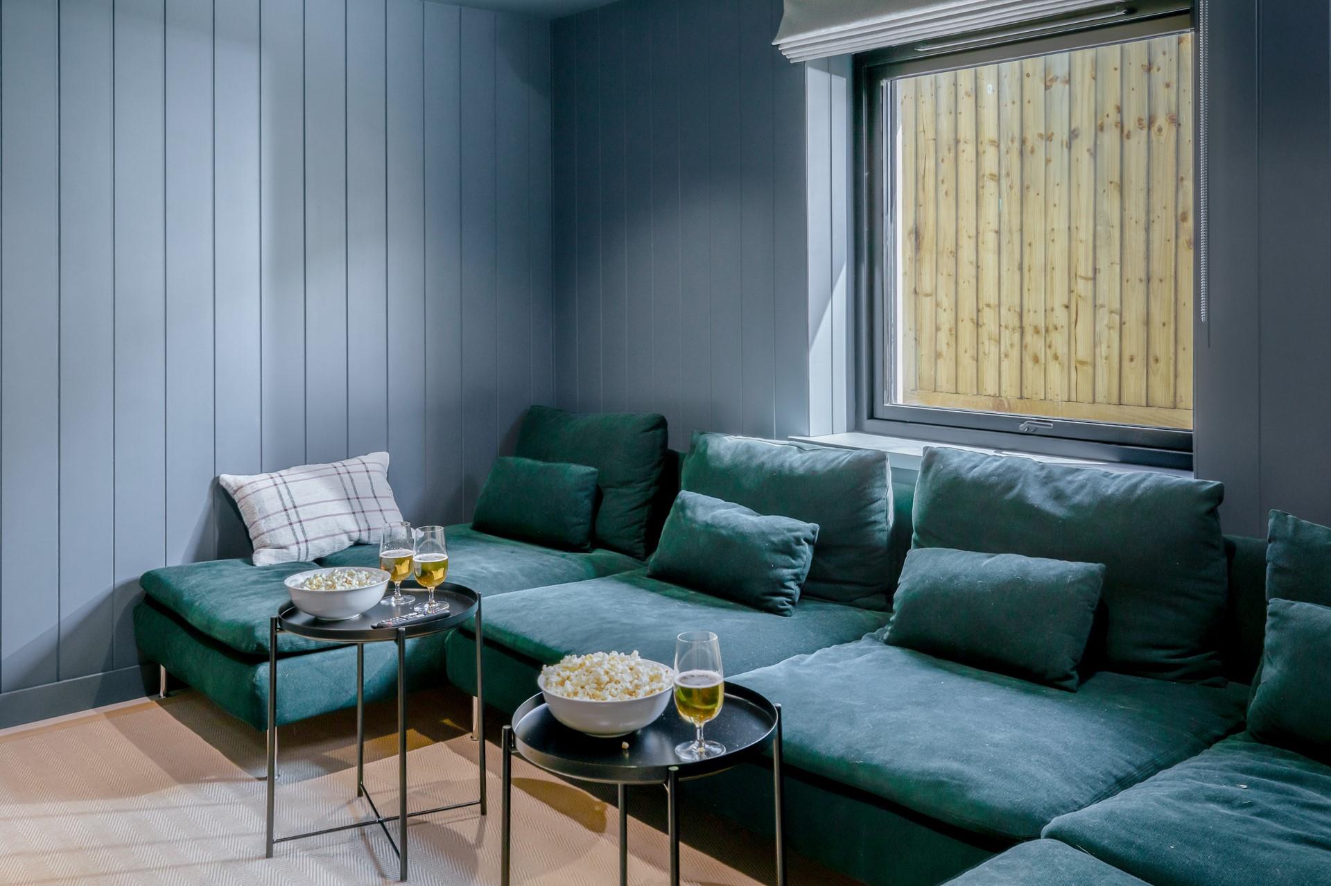 Grab some popcorn in the cinema room!