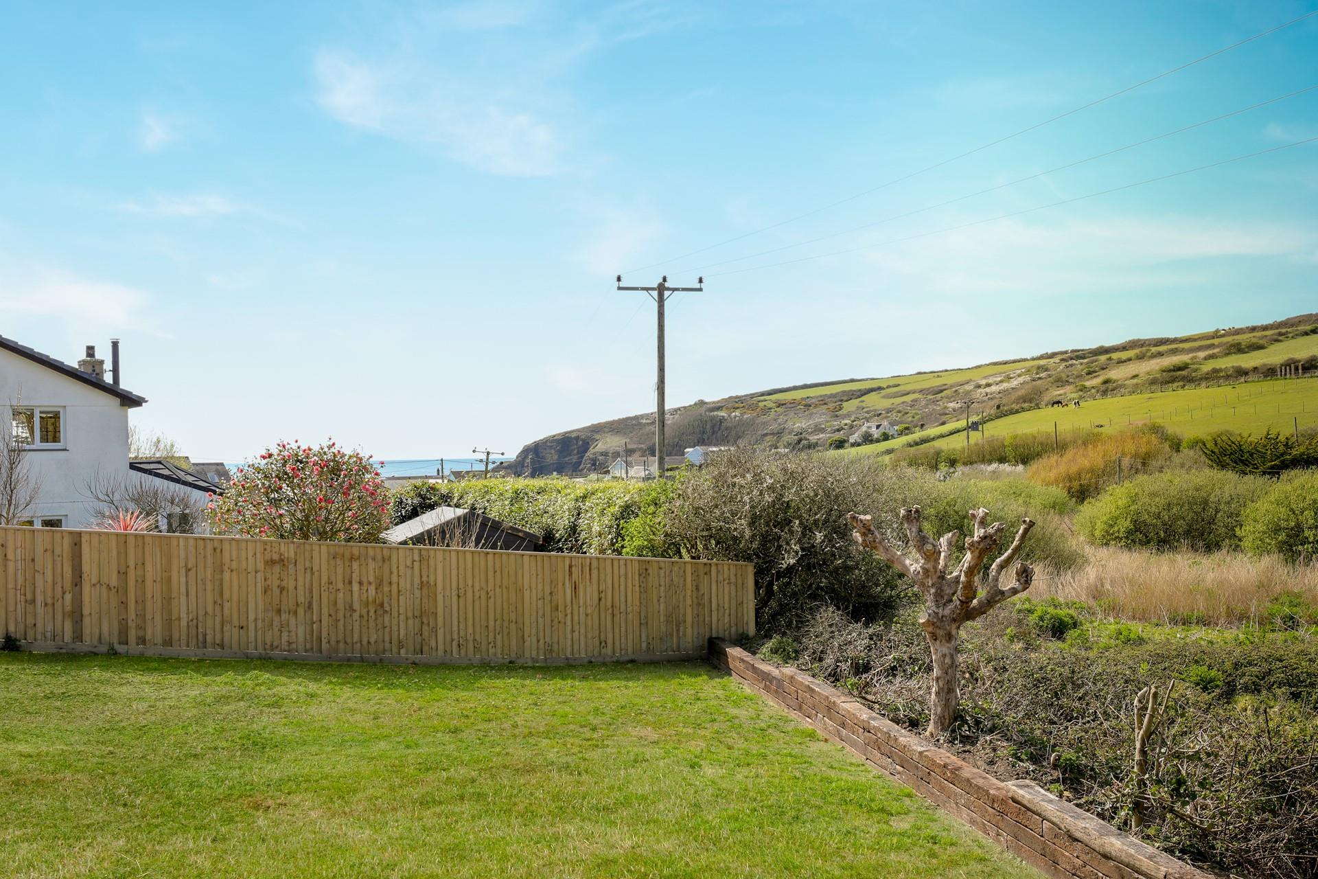 The beach is just a short walk from The Gables front door!