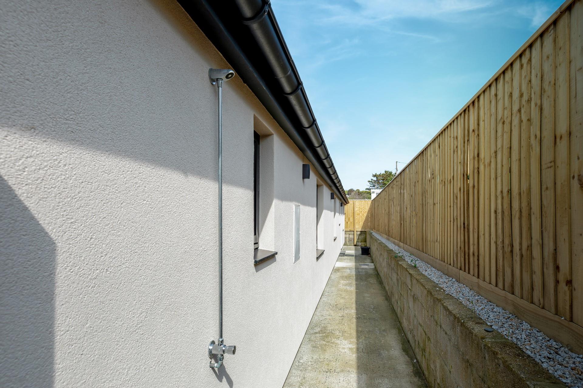 There is a handy outdoor shower for washing wetsuits.