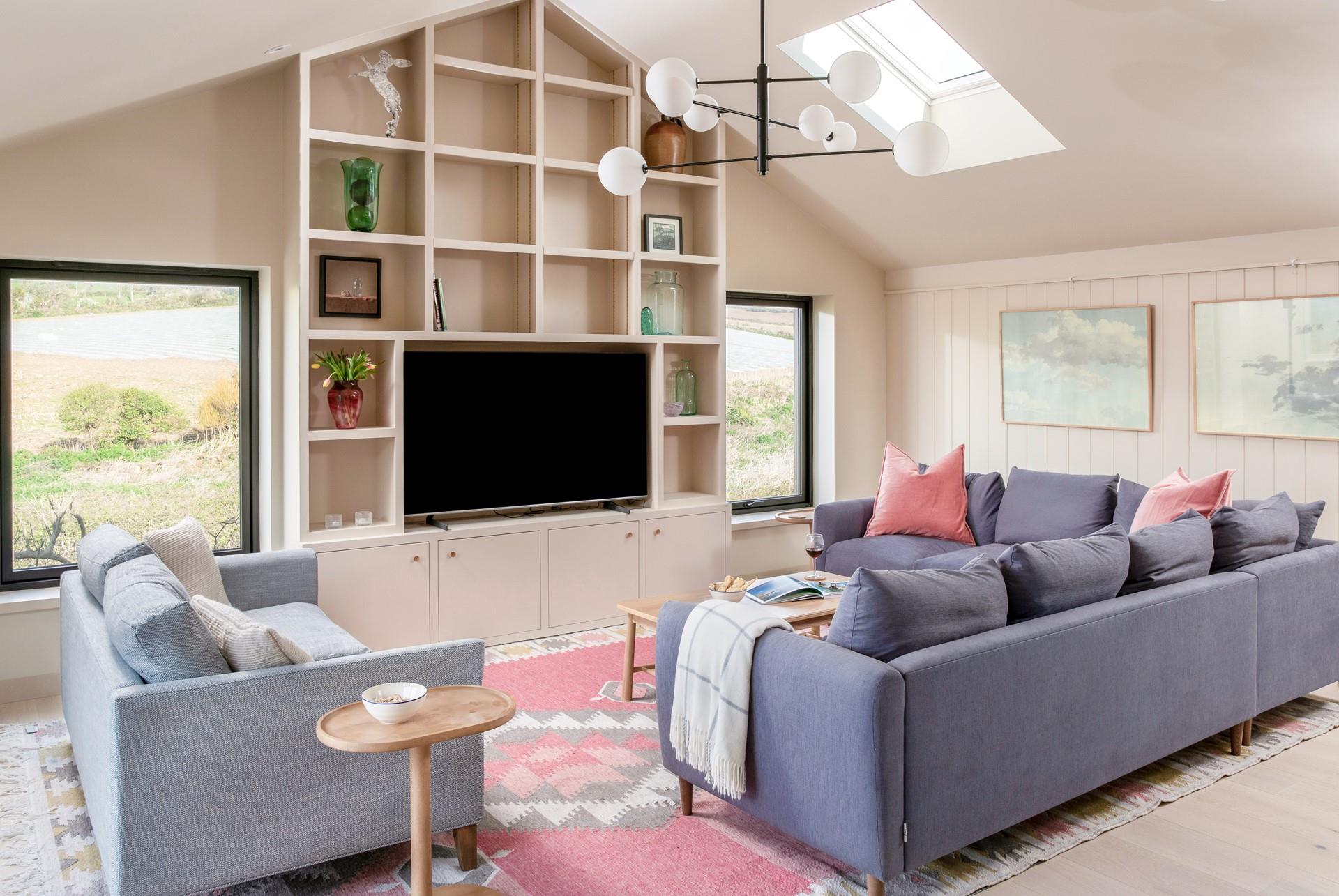 The sitting room is stylish and filled with light.