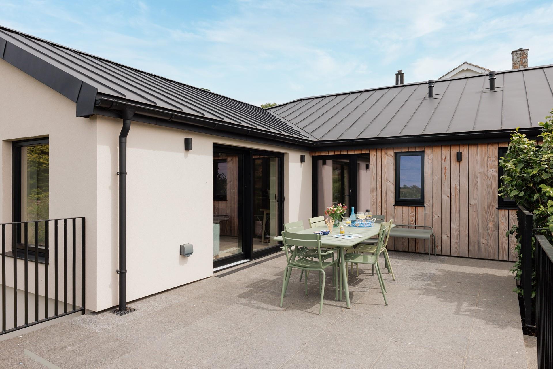 Step out onto the terrace from the living area.