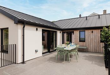 Step out onto the terrace from the living area.