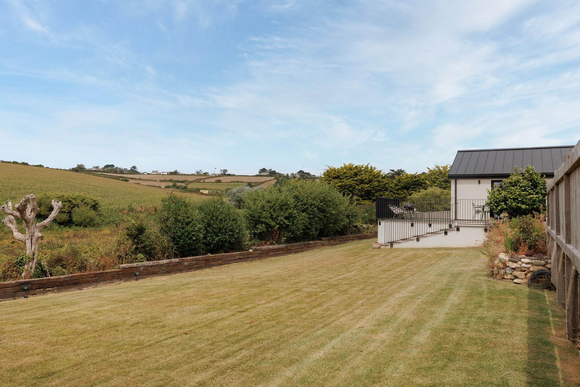 The large lawn is the perfect place to catch some rays. 