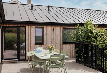 The terrace is the ideal suntrap for al fresco dining.