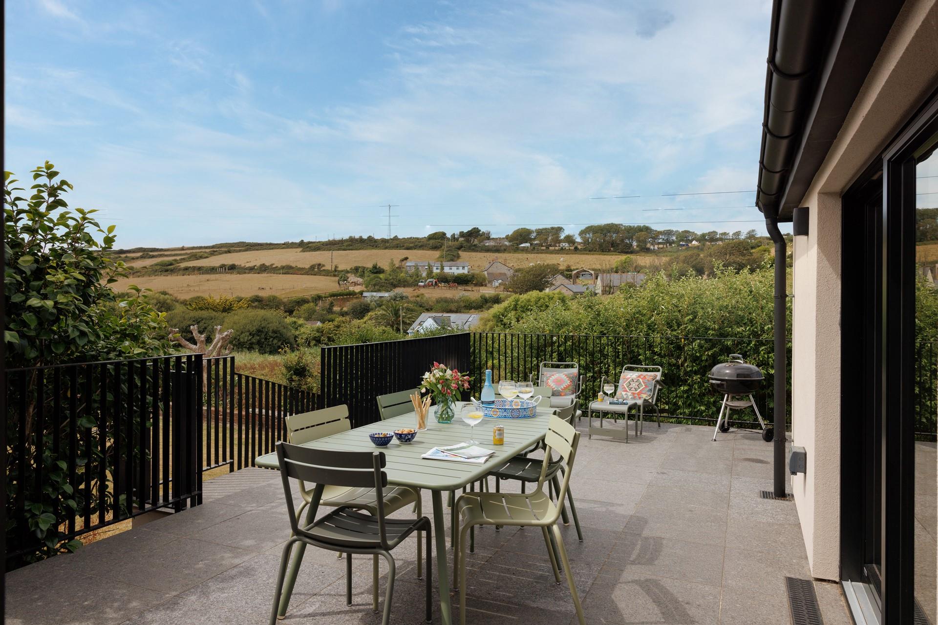 Enjoy a glass of wine and watch the sun go down.
