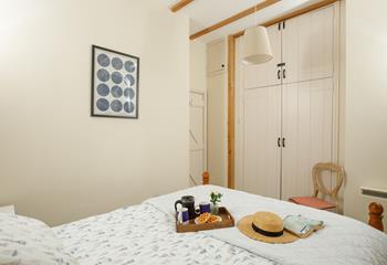 Bedroom 1 has a double bed and a Juliet balcony.