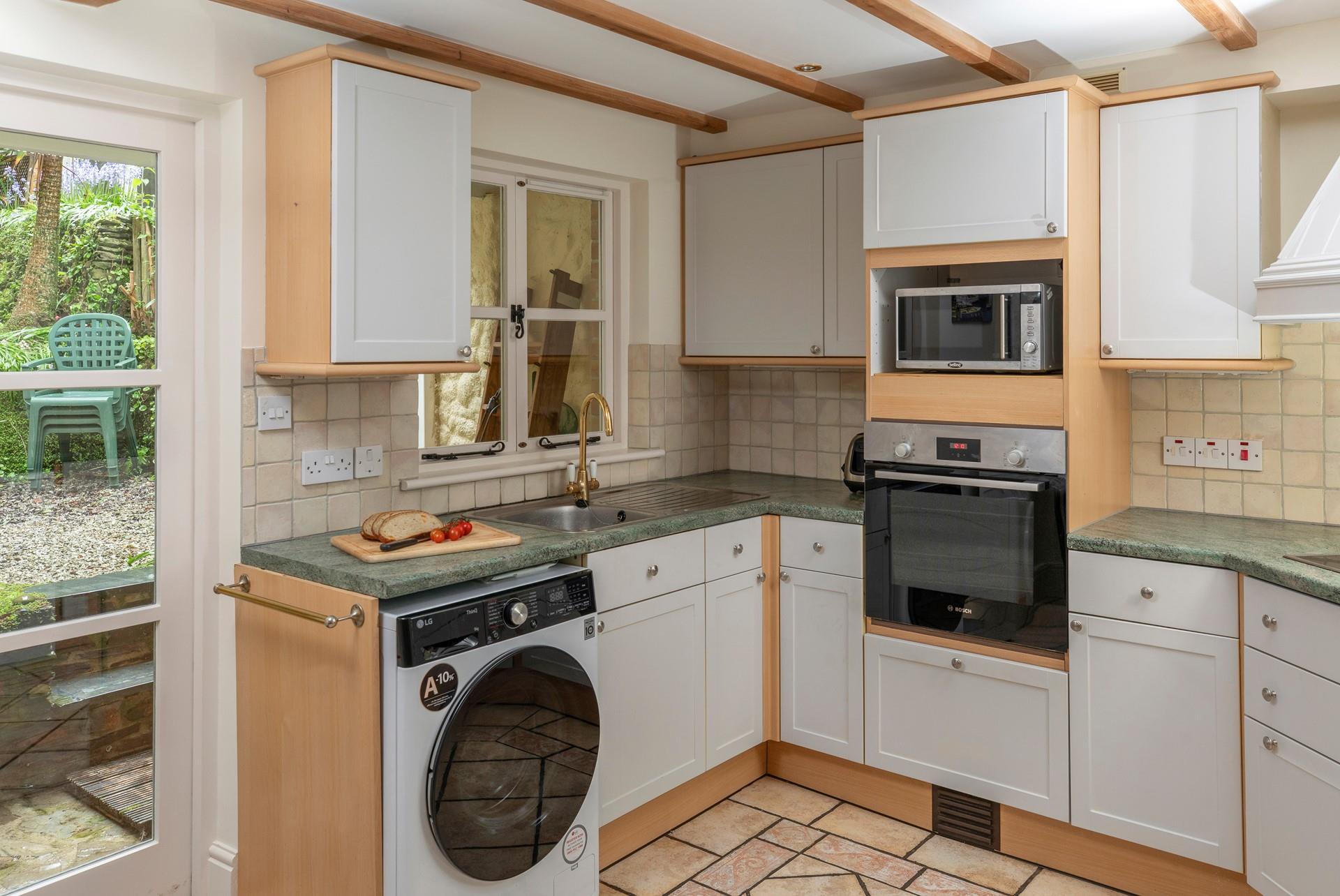 The kitchen is well equipped for cooking delicious meals.