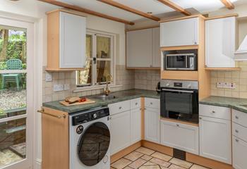 The kitchen is well equipped for cooking delicious meals.