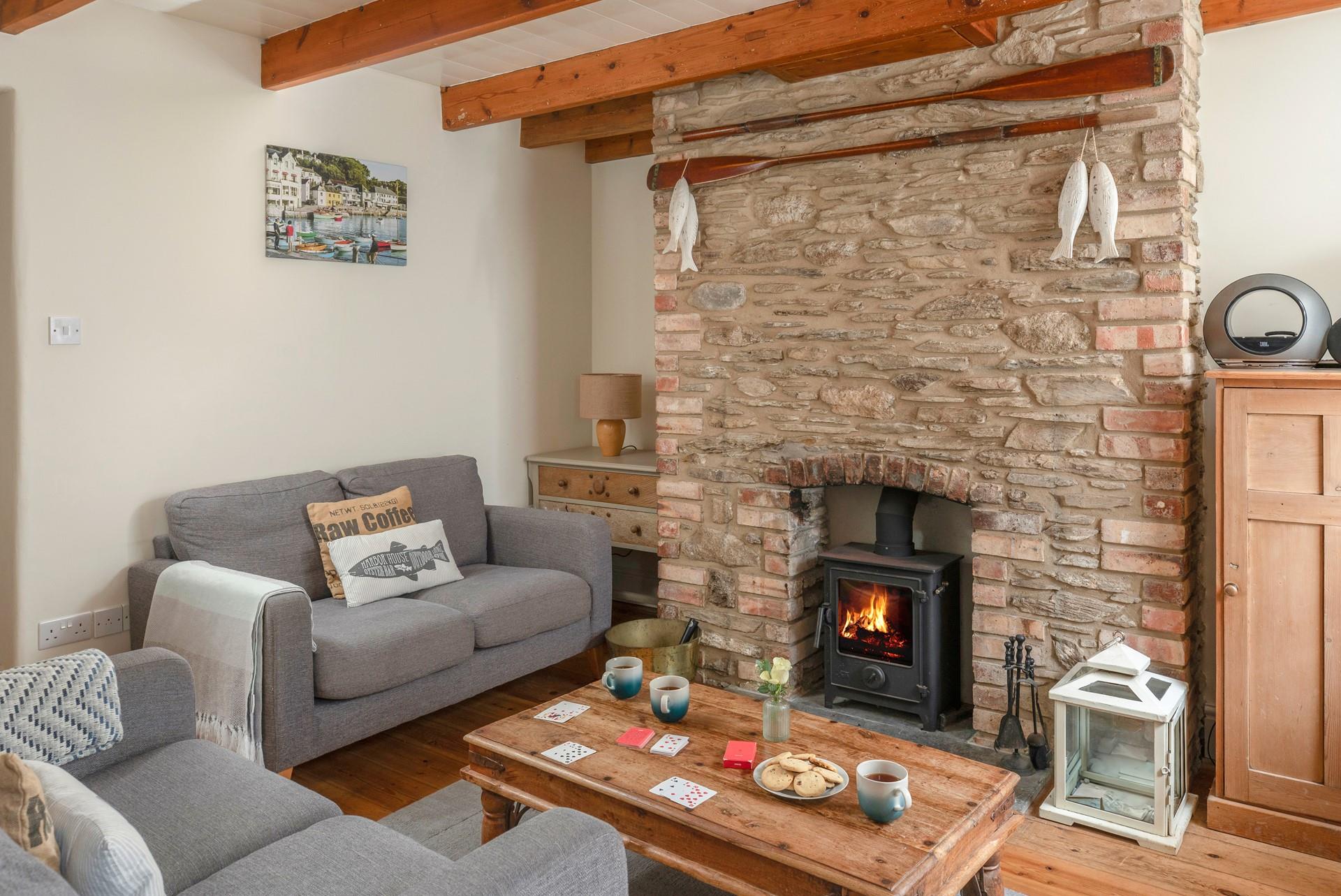 Light the woodburner and put your feet up in the cosy sitting room.