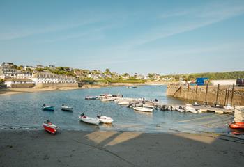The pretty harbour and quaint beach are a stone's throw away!