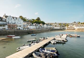 While away the hours watching colourful boats bob along the shoreline.
